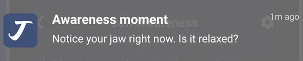 A JawSense awareness notification: notice your jaw right now. Is it relaxed?