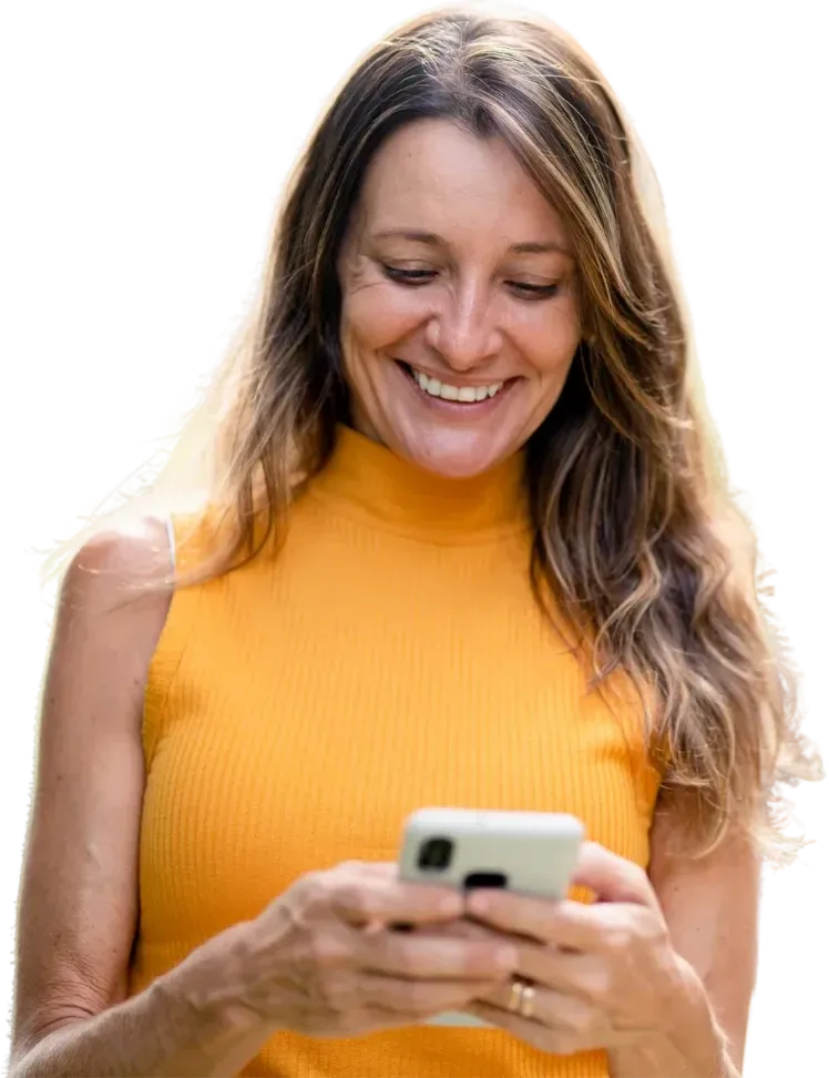 A woman looking at the JawSense app on her phone