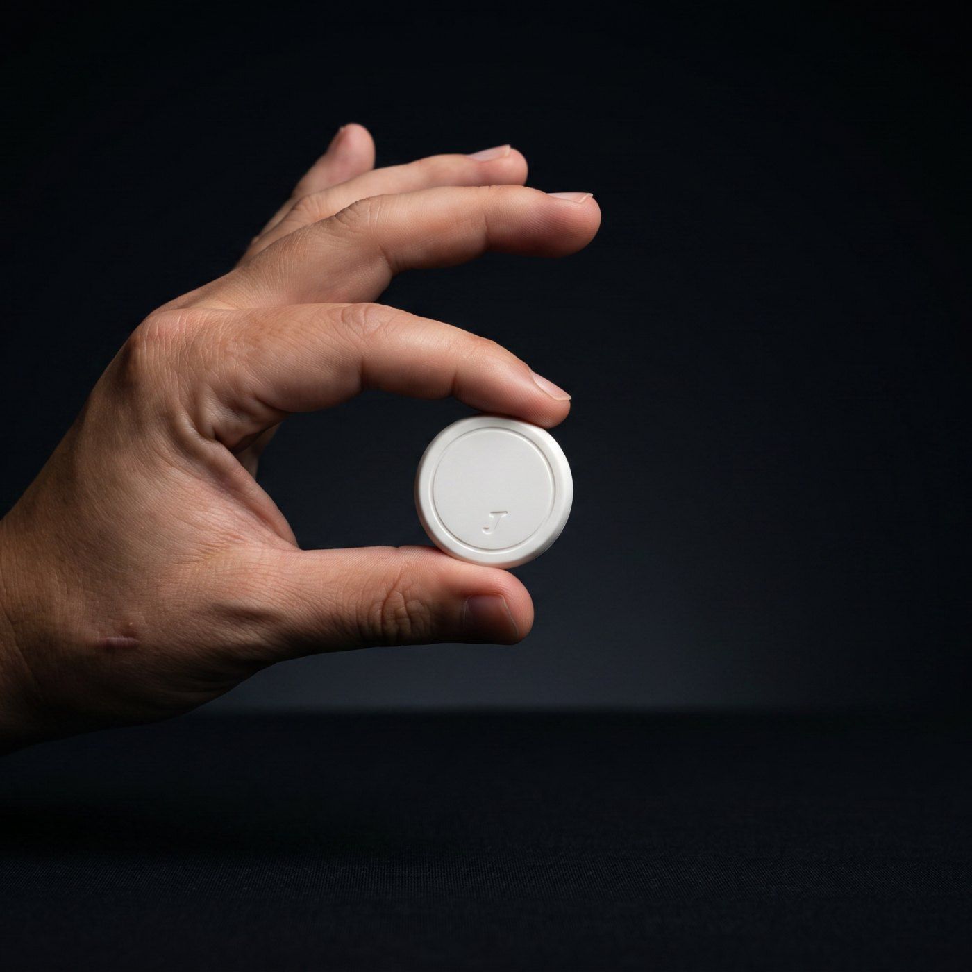 The JawSense ONE kit held in a hand