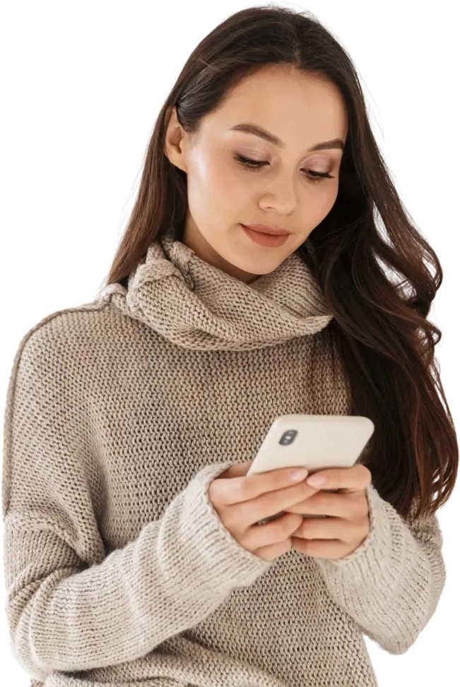 A woman looking at the JawSense app on her phone
